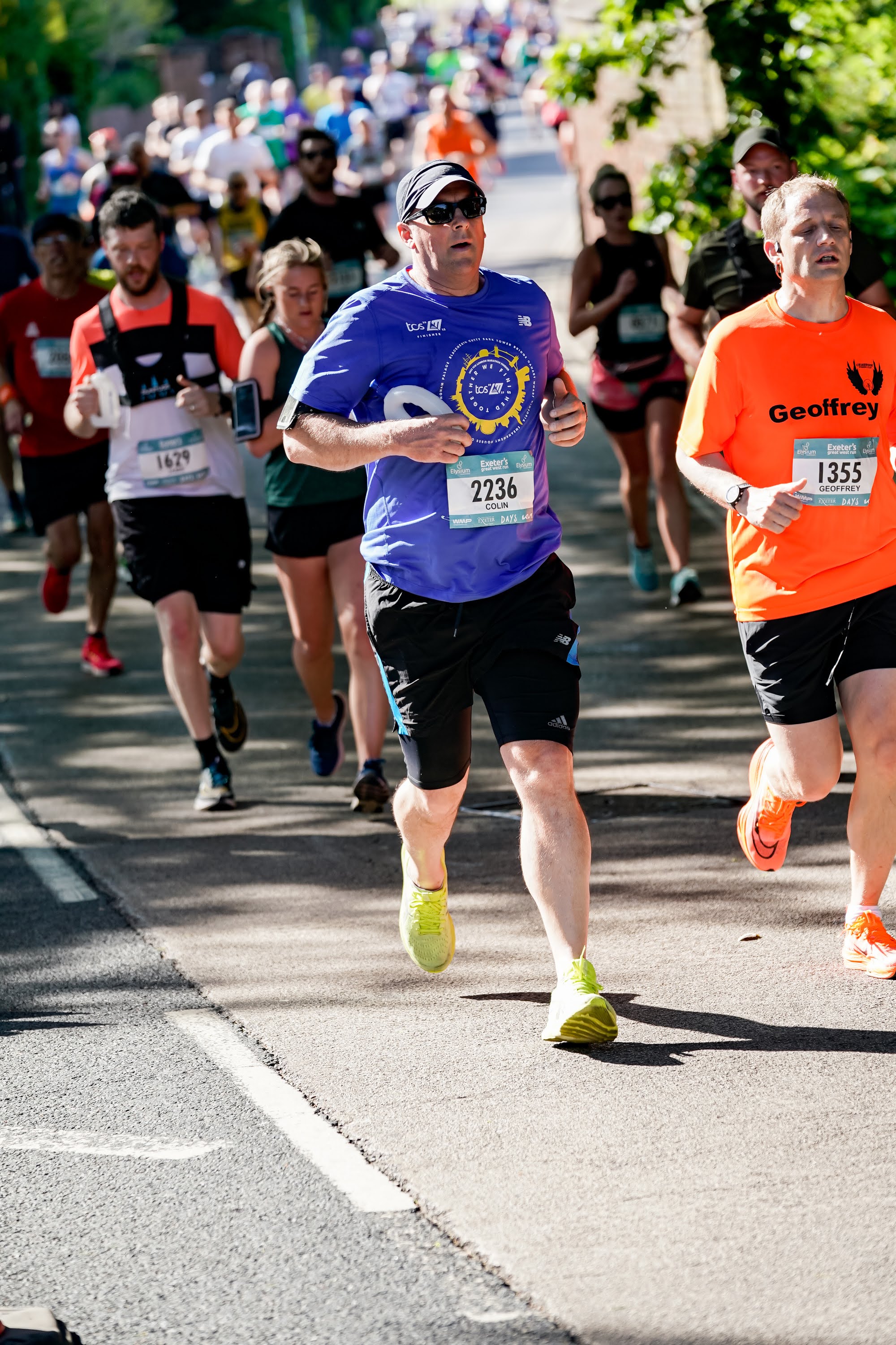 A photo of Geoffrey Hayward and other runners out running at the Great West Run.